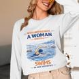 Swimming Never Underestimate A Woman Swim In Her Seventies Unisex Long Sleeve T-Shirt