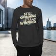 Masters Swimmer Still Swimming Competing Winning Adult Men's Long Sleeve T-Shirt Masters Swimmer Still Swimming Competing Winning Adult Men's Long Sleeve T-Shirt