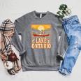 Lake Ontario Canoe Fishing Light House Sunset Retro Raglan Baseball Tee Raglan Sleeve Sweatshirt Deep Heather