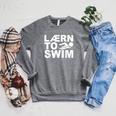 Learn To Swim Swimming Graphic Raglan Sleeve Sweatshirt Deep Heather Learn To Swim Swimming Graphic Raglan Sleeve Sweatshirt Deep Heather