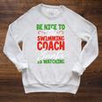 Swimming Coach Christmas Xmas Swimming Santa Raglan Sleeve Sweatshirt Heather Mustard Swimming Coach Christmas Xmas Swimming Santa Raglan Sleeve Sweatshirt Heather Mustard
