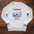 Swimming Never Underestimate A Woman Swim In Her Seventies Raglan Sleeve Sweatshirt Heather Mustard Swimming Never Underestimate A Woman Swim In Her Seventies Raglan Sleeve Sweatshirt Heather Mustard