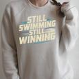 Masters Swimmer Still Swimming Competing Winning Adult Raglan Sleeve Sweatshirt Heather Forest