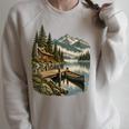 Women's Lakeside Canoe Cabin Escape Scene Raglan Sleeve Sweatshirt Heather Forest
