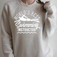 World's Best Swimming Instructor Teacher Coach Swim Men Women Kids Raglan Sleeve Sweatshirt Heather Forest World's Best Swimming Instructor Teacher Coach Swim Men Women Kids Raglan Sleeve Sweatshirt Heather Forest