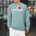 I LOVE HEART SWIMMING Raglan Sleeve Sweatshirt Cardinal I LOVE HEART SWIMMING Raglan Sleeve Sweatshirt Cardinal