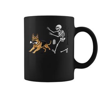 German Shepherd Dog Stealing Bone From Skeleton Halloween Coffee Mug | Seseable UK