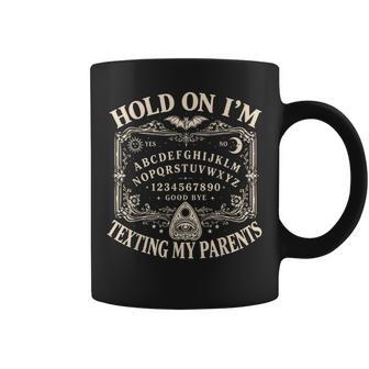 Hold On I'm Texting My Parents Ouija Board Spooky Mom Dad Coffee Mug | Seseable UK
