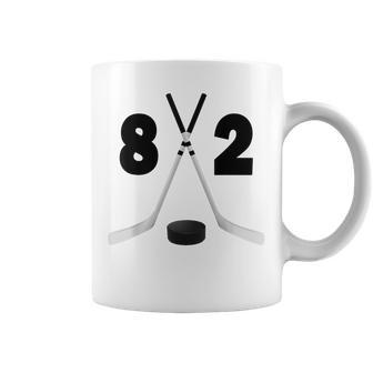 Deporte Palos De Hockey Y Disco Con El Número Ochenta Dos-No 82 Taza de café - Regaloses