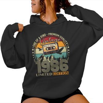40 Cumpleaños Hombre Regalo Abril 1986 In Mangas Sudadera con capucha para mujer - Regaloses