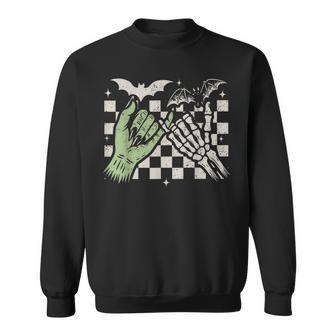 Retro Checkered Pinky Promise Witch Skeleton Halloween Sweatshirt | Seseable UK