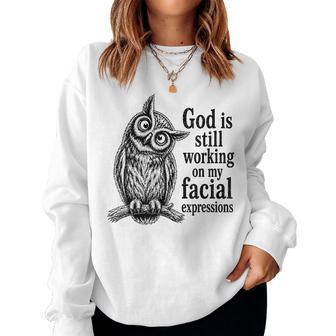 God Is Still Working On My Facial Expressions Wise Owl Humor Women Sweatshirt | Seseable UK