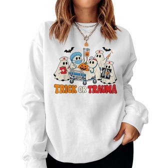 Trick Or Trauma Nurse Ghosts Halloween Er Nurse Hospital Women Sweatshirt | Seseable UK