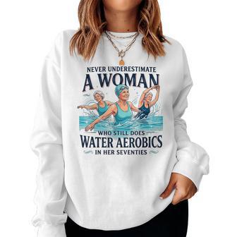 Never Underestimate A Woman Water Aerobics In Her Seventies Women Sweatshirt - Thegiftio UK