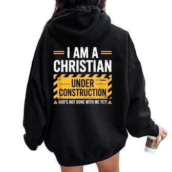 I Am A Christian Under Construction Religious Quote Women Oversized Hoodie Back Print - Thegiftio UK