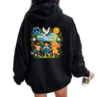 Journée Internationale De La Paix Journée Mondiale De La Paix Pour Enfants Garçons Filles Sweat à capuche oversize pour femme avec imprimé dans le dos - Cadeauxyz