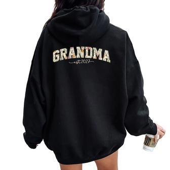 Promoted To Grandma Est 2027 Floral New Grandparents Women Oversized Hoodie Back Print | Seseable UK