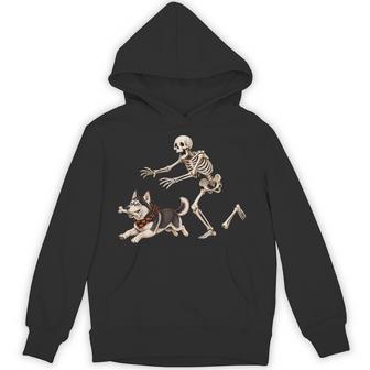 Husky Dog Stealing Bone From Skeleton Halloween Hoodie - Thegiftio UK