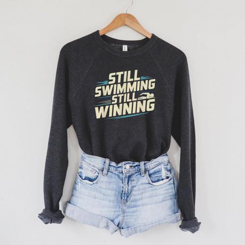Masters Swimmer Still Swimming Competing Winning Adult Raglan Sleeve Sweatshirt - SwimGear Co