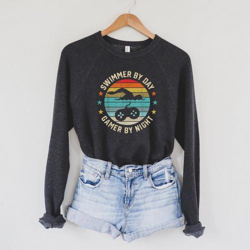 Swimmer By Day Gamer By Night Swimming Swim Lover Gaming Raglan Sleeve Sweatshirt - SwimGear Co