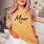 Beautiful Handwritten Font Momo Calligraphy レディースオーバーサイズコンフォートTシャツ Mustard Beautiful Handwritten Font Momo Calligraphy レディースオーバーサイズコンフォートTシャツ Mustard