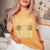 The Legend Has Retired 2026 面白い引用 レディースオーバーサイズコンフォートTシャツ Mustard The Legend Has Retired 2026 面白い引用 レディースオーバーサイズコンフォートTシャツ Mustard