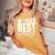 メンズ 世界一のおばあちゃん ドライ レディースオーバーサイズコンフォートTシャツ Mustard