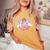 メルちゃん くまさんカーでlet's Go Drive 〜Under The Rainbow〜【片面プリント】 レディースオーバーサイズコンフォートTシャツ Mustard メルちゃん くまさんカーでlet's Go Drive 〜Under The Rainbow〜【片面プリント】 レディースオーバーサイズコンフォートTシャツ Mustard