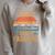 I Need A Good Paddling Retro Sunset Canoe Raglan Baseball Tee Raglan Sleeve Sweatshirt Heather Forest
