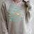 Women's Swimming Against The Current Motivational Inspiration Raglan Sleeve Sweatshirt Heather Forest Women's Swimming Against The Current Motivational Inspiration Raglan Sleeve Sweatshirt Heather Forest