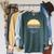 Canoe Canoeing Vintage Sunset Raglan Sleeve Sweatshirt Heather Blue Lagoon