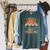I Need A Good Paddling Retro Sunset Canoe Raglan Baseball Tee Raglan Sleeve Sweatshirt Heather Blue Lagoon