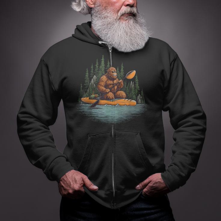 Bigfoot Kayak Paddling Lake Canoe Bigfoot Sasquatch Kayaking Zip Up Hoodie