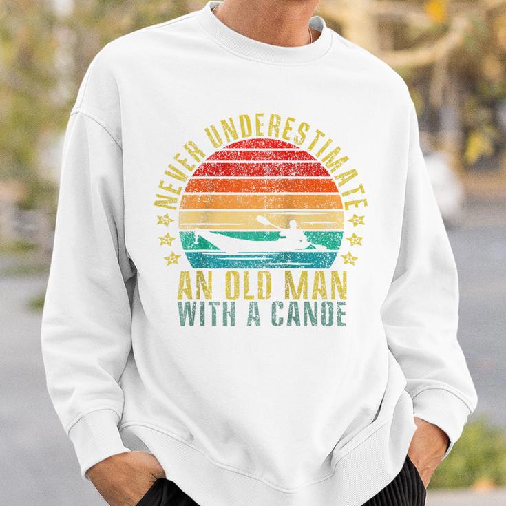 Never Underestimate An Old Man With a Canoe Retro Raglan Baseball Tee Sweatshirt Gifts for Him