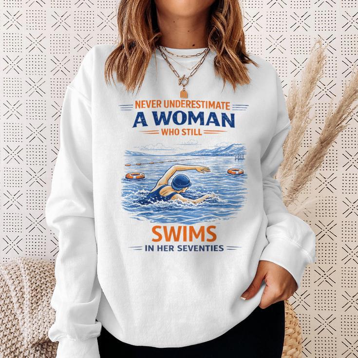 Swimming Never Underestimate A Woman Swim In Her Seventies Sweatshirt Gifts for Her Swimming Never Underestimate A Woman Swim In Her Seventies Sweatshirt Gifts for Her