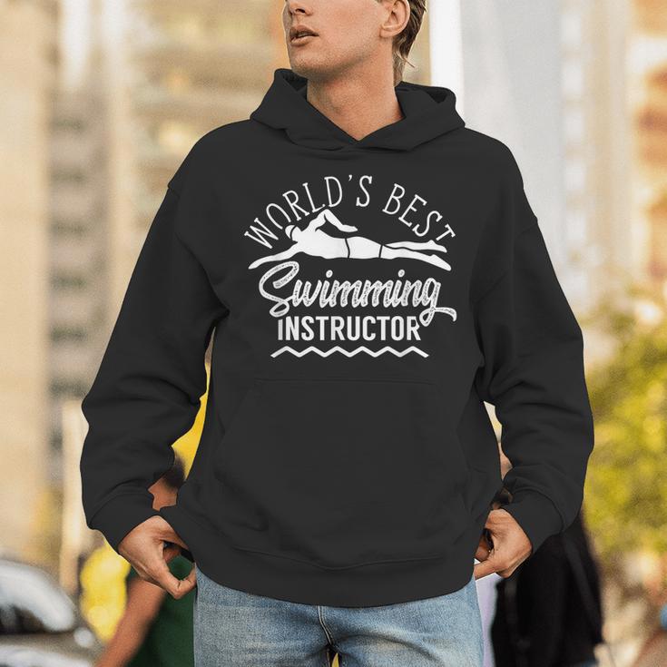 World's Best Swimming Instructor Teacher Coach Swim Men Women Kids Unisex Hoodie World's Best Swimming Instructor Teacher Coach Swim Men Women Kids Unisex Hoodie