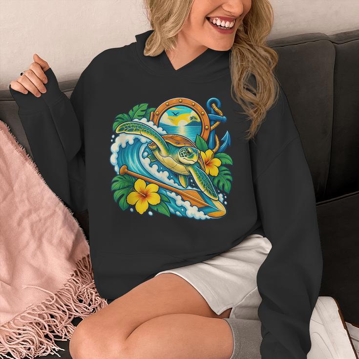 Green Sea Turtle Surfs Past a Canoe Paddle Sleeveless Unisex Hoodie