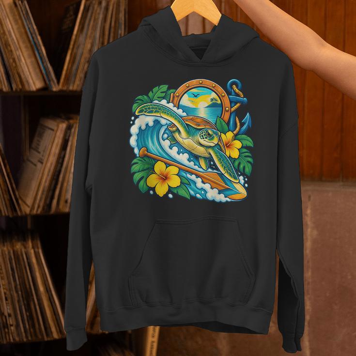 Green Sea Turtle Surfs Past a Canoe Paddle Sleeveless Unisex Hoodie