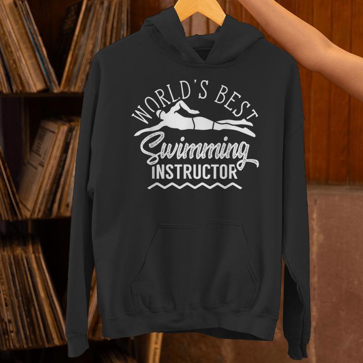 World's Best Swimming Instructor Teacher Coach Swim Men Women Kids Unisex Hoodie World's Best Swimming Instructor Teacher Coach Swim Men Women Kids Unisex Hoodie
