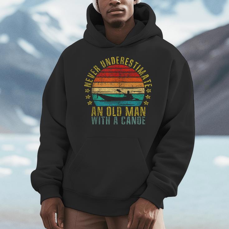 Never Underestimate An Old Man With a Canoe Retro Sleeveless Men Hoodie