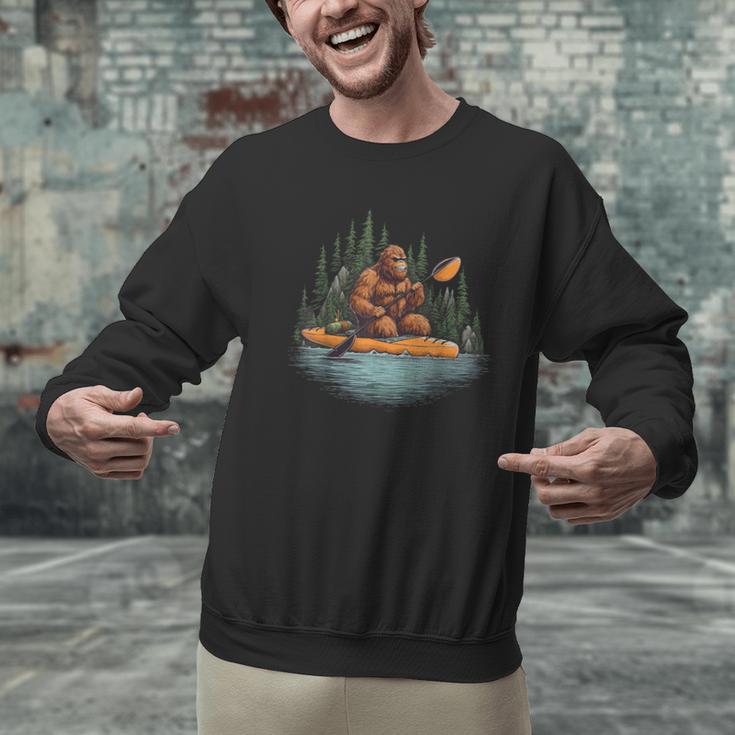 Bigfoot Kayak Paddling Lake Canoe Bigfoot Sasquatch Kayaking Men Graphic Sweatshirt