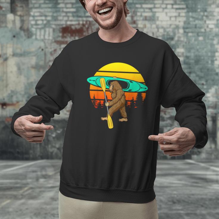 Bigfoot Kayak Paddling Lake Rafts Inflatable Canoe Sasquatch Men Graphic Sweatshirt Bigfoot Kayak Paddling Lake Rafts Inflatable Canoe Sasquatch Men Graphic Sweatshirt