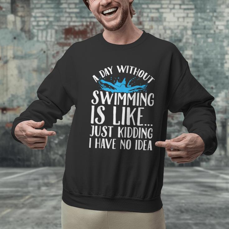 A Day Without Swimming Is Like Swimming Swimmer T-Shirt Men Graphic Sweatshirt A Day Without Swimming Is Like Swimming Swimmer T-Shirt Men Graphic Sweatshirt