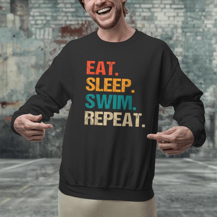 Eat Sleep Swim Repeat Pool Swimmer Water Polo Swimming Men Graphic Sweatshirt Eat Sleep Swim Repeat Pool Swimmer Water Polo Swimming Men Graphic Sweatshirt