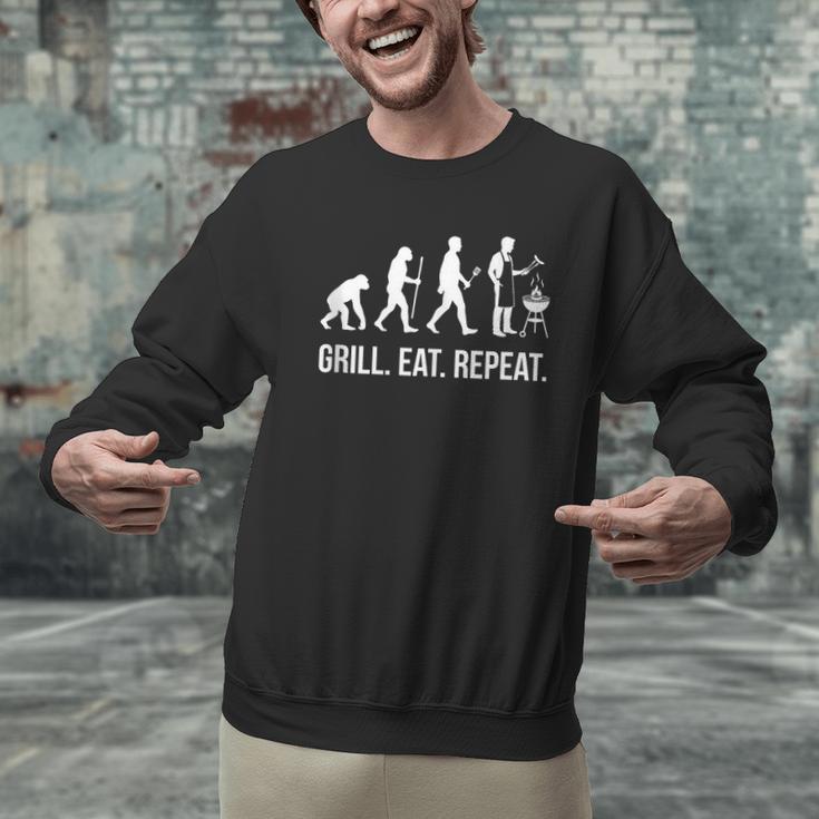 Grill Eat Repeat BBQ Dad Evolution Barbecue Men Graphic Sweatshirt Grill Eat Repeat BBQ Dad Evolution Barbecue Men Graphic Sweatshirt
