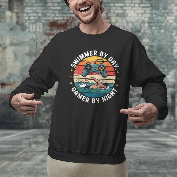 Swimmer By Day Gamer By Night Swimming Vintage Gaming Swim Men Graphic Sweatshirt Swimmer By Day Gamer By Night Swimming Vintage Gaming Swim Men Graphic Sweatshirt