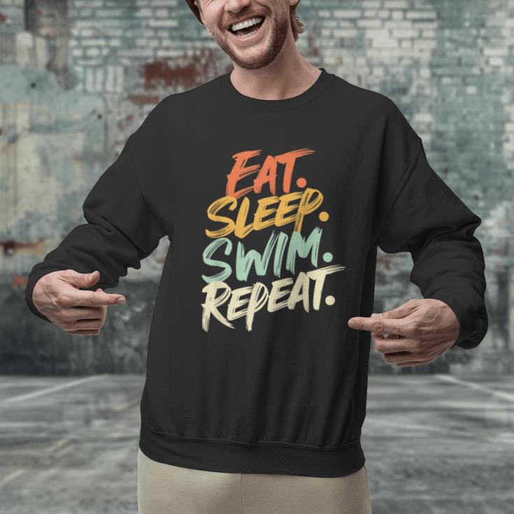 Swimmer Eat Sleep Swim Repeat I Swimming Men Graphic Sweatshirt Swimmer Eat Sleep Swim Repeat I Swimming Men Graphic Sweatshirt