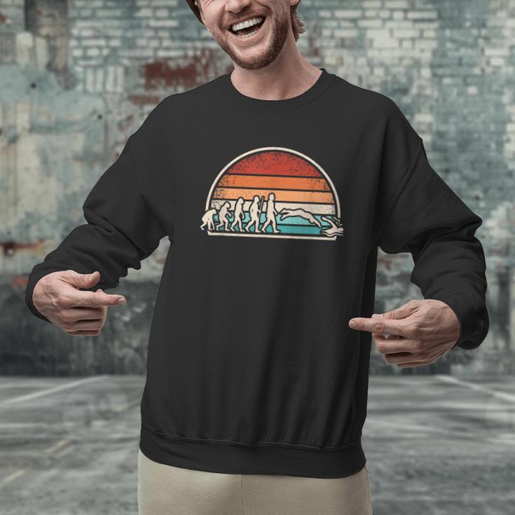Swimming Evolution Retro Swim Swimmer Men Women Men Graphic Sweatshirt Swimming Evolution Retro Swim Swimmer Men Women Men Graphic Sweatshirt