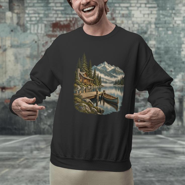 Women's Lakeside Canoe Cabin Escape Scene Men Graphic Sweatshirt Women's Lakeside Canoe Cabin Escape Scene Men Graphic Sweatshirt