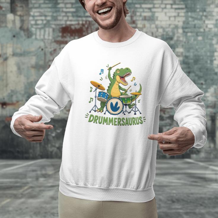 T-Rex Drumming With Drum Kit And Musical Notes Men Graphic Sweatshirt T-Rex Drumming With Drum Kit And Musical Notes Men Graphic Sweatshirt